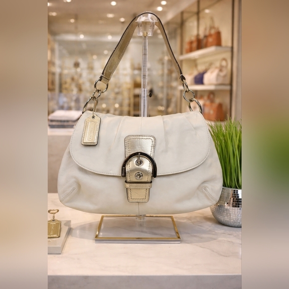 Coach Handbags - Coach Soho Buckle White Ivory Shoulder Flap Bag with Gold Metallic Accents